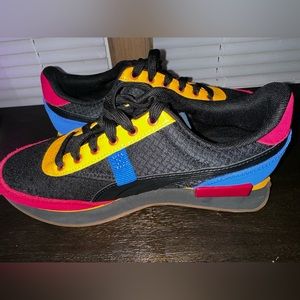 Pumas multi-color big kids size7.